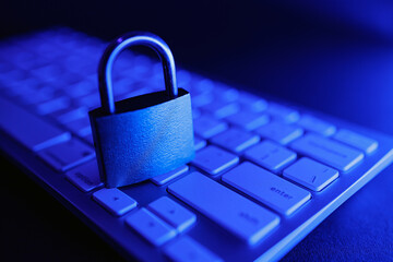 Cyber security lock on computer keyboard highlighting internet protection measures
