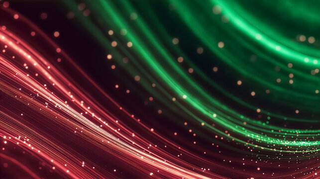 Colorful light waves flow smoothly with glowing particles creating an abstract background. Dark blurred setting enhances vibrant red and green colors. Concept of digital art, visual effects, design