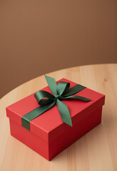 red gift box with green ribbon