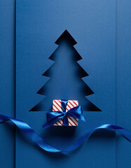 blue Christmas paper card with giftbox and ribbon