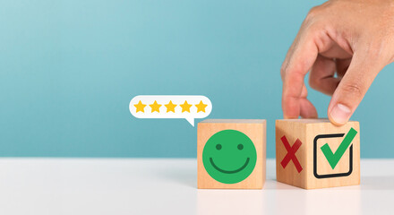 Excellent, positive feedback, service rating and satisfaction. Customer select wooden cube with checkmark tick to indicate their satisfaction with the service