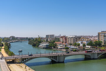 Obraz premium Sevilla, Spain - August 01, 2024: San Telmo Bridge (1931), Seville, Spain