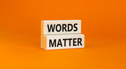 Words matter symbol. Concept word Words matter on beautiful wooden blocks. Beautiful orange paper background. Business words matter concept. Copy space.