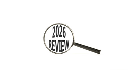 2026 Review symbol. Concept words 2026 Review on beautiful white paper. Black magnifying glass. Beautiful white paper background. Business and 2026 review concept. Copy space.