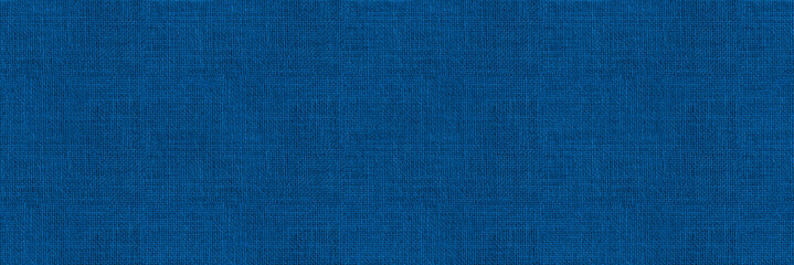 Blue fabric background – seamless texture of textile material. Long wide backdrop of woven linen cloth swatch.