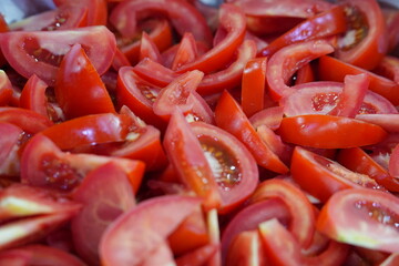 Fresh cherry tomato slices with seeds visible