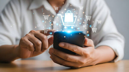 Online shopping concept man using smartphone with digital shopping cart overlay