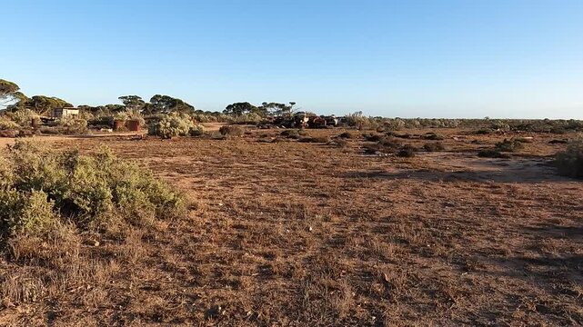 Australian Outback Sunset: A Vast and Remote Landscape at Koonalda Homestead, Nullarbor Plain