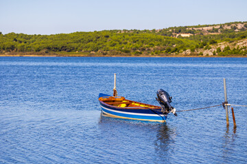 Small fishing boat moored on the Gruissan lagoon
