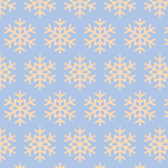 Soft seamless pattern with beige snowflakes on a light blue background. Perfect for winter design, holiday decor, wrapping paper and seasonal projects.