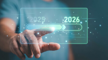 Futuristic hand touches glowing progress bar showing transition and advancement into future 2026 with optimistic motion and digital progress indicators moving to the year 2026 Concept