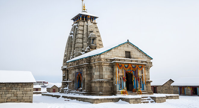 Kedarnath temple, shrine covered with snow. Kedarnath temple is a Hindu temple dedicated to Shiva. Located on the Garhwal Himalayan range near the Mandakini rive