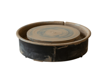 Dirty pottery wheel with clay residue isolated on transparent background