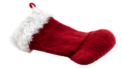 Red Christmas stocking with white fur trim isolated on white background