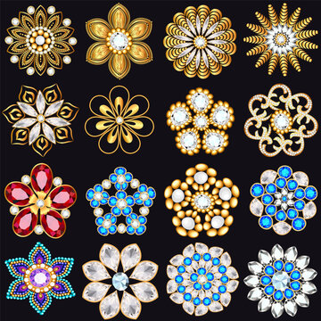 Collection of ornate gemstone brooches in gold and multicolor against a dark  background
