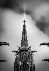 Gothic Cathedral Spire with Gargoyles and Dramatic Sky Gothic architecture sculpture