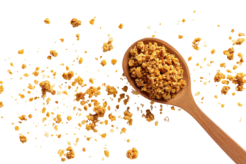 Wooden spoon filled with granola and scattered isolated on transparent background. Wooden spoon filled with granola and scattered isolated on white background.