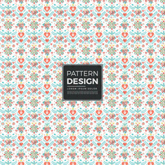 Seamless folk pattern with stylized hearts, flowers, and leaves motif. © MdAzizul