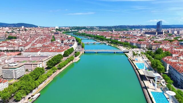 Aerial View of City River and Bridge, Urban Skyline Landscape, Waterfront Architecture, Scenic European Cityscape Footage for Travel and Tourism Projects.
