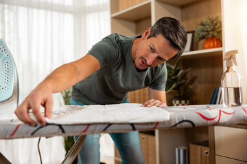 Man Preparing For Ironing Clothes