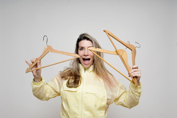 Woman feeling excited by clothes and fashion shopping