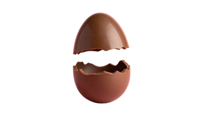 A cracked chocolate egg, its two halves separated against a stark black background