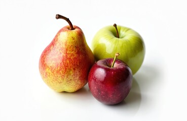 Fresh ripe pear, green, red apples isolated on white background. Group of juicy colourful fruits for healthy diet. Organic raw vegetarian food offers natural vitamin nourishment. Delicious autumn