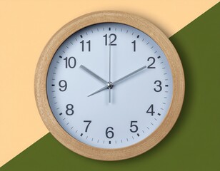 Simple Wooden Round Wall Clock Displaying Time with Hour and Minute Hands on a Split Color Background