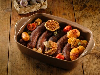 Savor the flavors of traditional Romanian cuisine with this hearty dish of roasted pork sausages and golden potato wedges. Seasoned with herbs and garlic, it’s perfect for winter