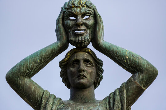 Close-up detail of the classical bronze figure from the Monument to Jacinto Benavente in Madrid&rsquo;s Buen Retiro Park, Spain