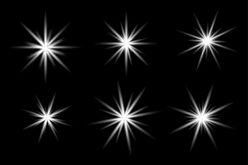 Fototapeta premium Glowing White Star Light Effects – Sparkle Burst Lens Flare Vector Set.
