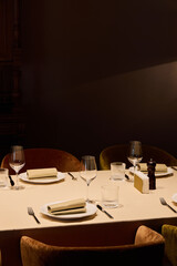 intimate restaurant nook beautifully arranged with sophisticated place settings and cozy ambiance