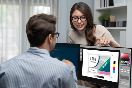 Graphic designer software for modern design of web page and commercial brisk ads showing on the computer screen - Powered by Adobe