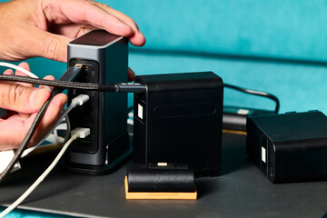 Battery charger. Multi-battery charger with multiple USB ports