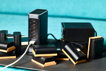 Battery charger. Multi-battery charger with multiple USB ports