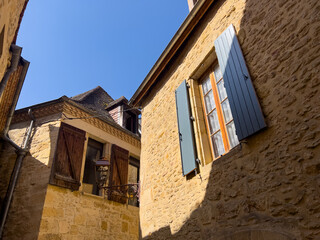 Traditional Stone Houses with Wooden Shutters in Sarlat la Caneda, France