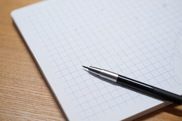 Pencil and Notebook on Wooden Desk Blank Page Composition for Writing Notes Plans Modern Office Workspace Education