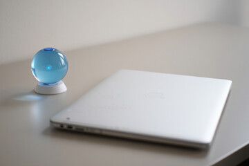 Modern Office Desk with Blue Sphere Lamp and Tablet for Tech Savvy Professional and Minimalist Workspace Design Concept 150 Char