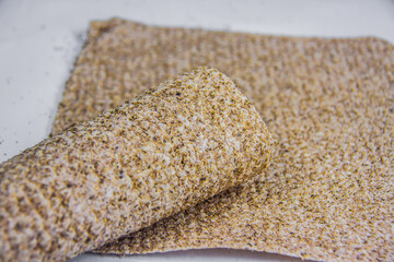 Chia seeds bread, golden yellow bakery food, sandwich roll, heathy digestive meal, bread sheet, studio shot, isolated on white background, selective focus, shallow depth of field, Cairo Egypt