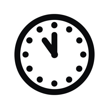 Black solid icon of a round clock face with hands pointing to 11 o'clock time watch