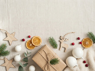 Minimal Scandinavian Christmas Flat Lay with Natural Decor and Gift