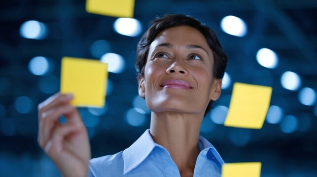 A confident woman holds a sticky note. She smiles while contemplating her ideas. This image captures creativity in a professional environment. Perfect for business or brainstorming themes. AI