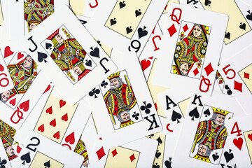 Casino cards as background.Background on the theme of playing cards and poker.A pile of gaming cards.Poker card texture.Casino.
