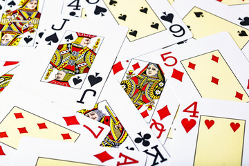 Casino cards as background.Background on the theme of playing cards and poker.A pile of gaming cards.Poker card texture.Casino.