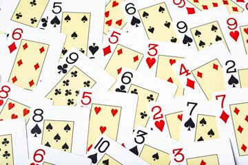 Casino cards as background.Background on the theme of playing cards and poker.A pile of gaming cards.Poker card texture.Casino.