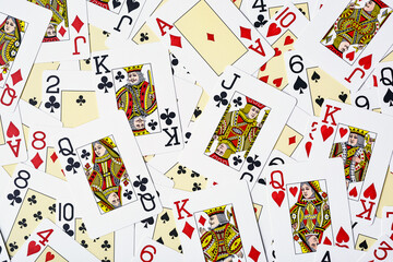 Casino cards as background.Background on the theme of playing cards and poker.A pile of gaming cards.Poker card texture.Casino.