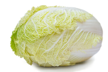 Fresh napa cabbage with crisp leaves displayed on a white background in a minimalistic setting