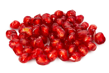 Fresh pomegranate seeds isolated on a clean white background, showcasing their vibrant red color and juicy texture
