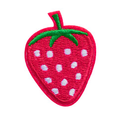 Close-up of a cute embroidered strawberry patch. This red fruit applique with a green leaf is isolated on a transparent background, ideal for sewing and craft projects