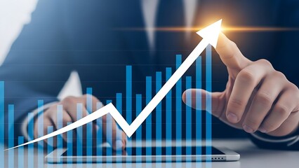 Business person pointing at upward trending arrow graph on tablet